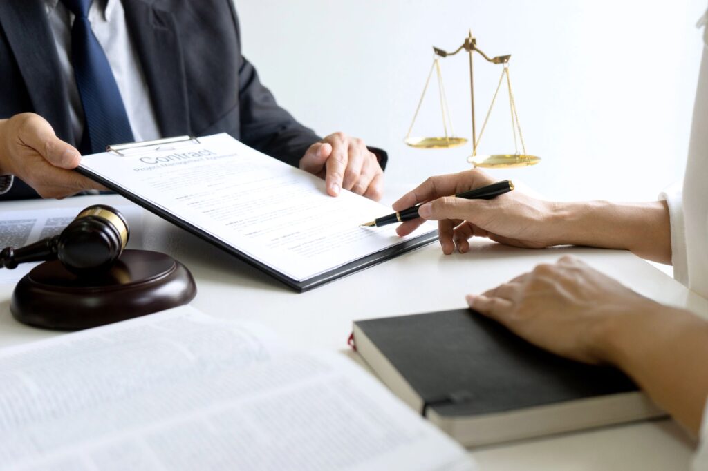 A lawyer reviewing estate planning documents with a client.